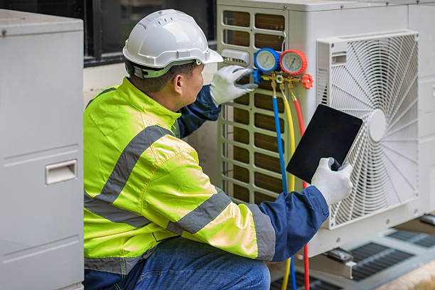 Professional Heat Pump Repair technician working in Floral Park, NY